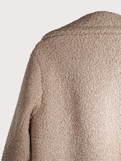 Le manteau long imitation peau de mouton