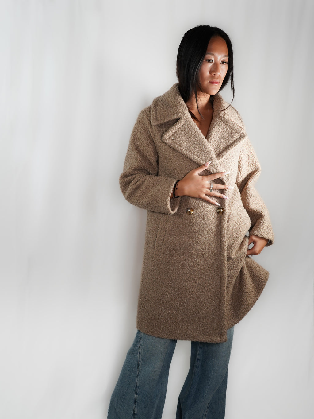 Le manteau long imitation peau de mouton